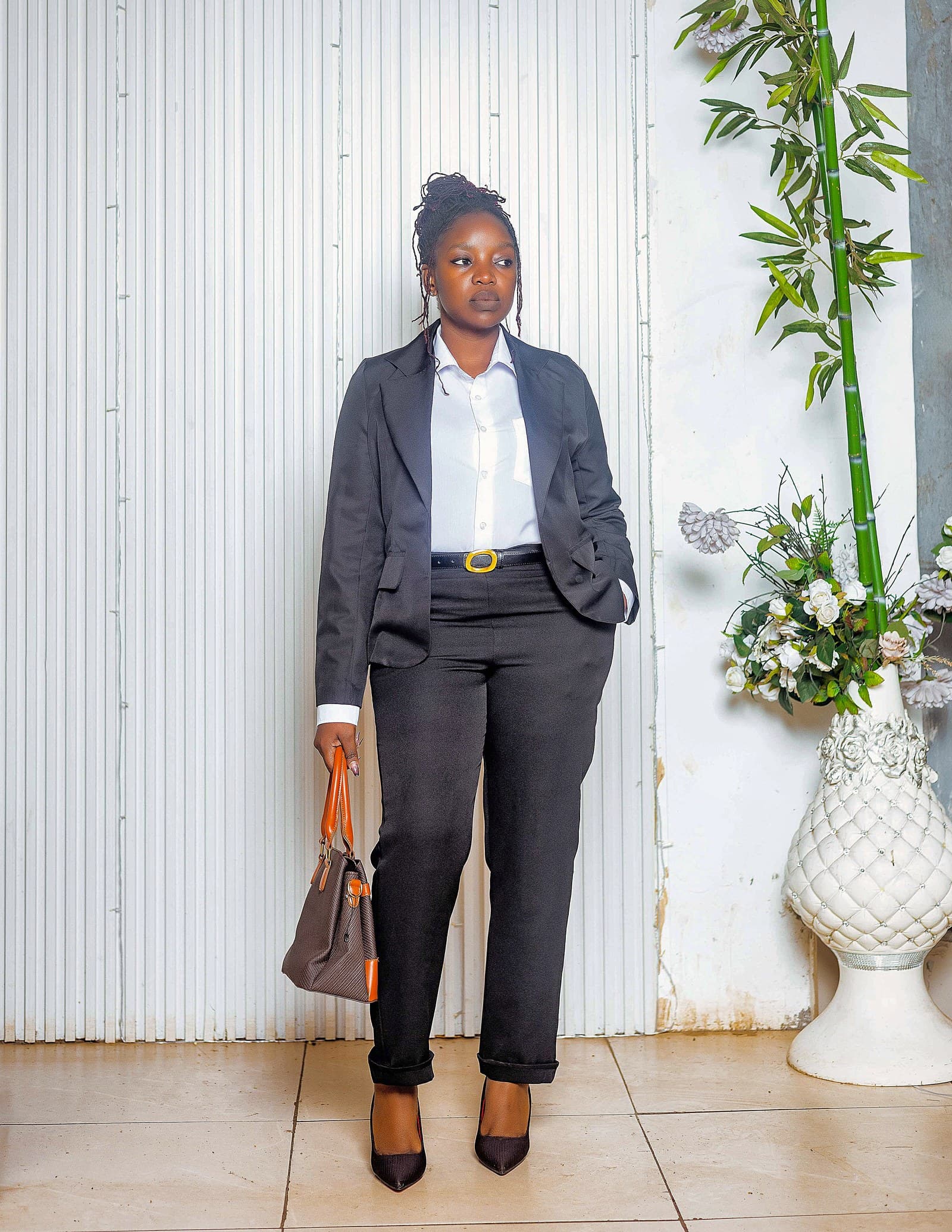 Black blazer, white shirt and black trousers